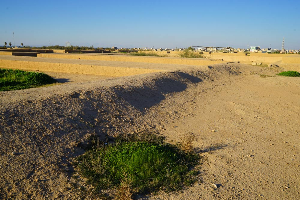 Earthen berm installed to retain water.