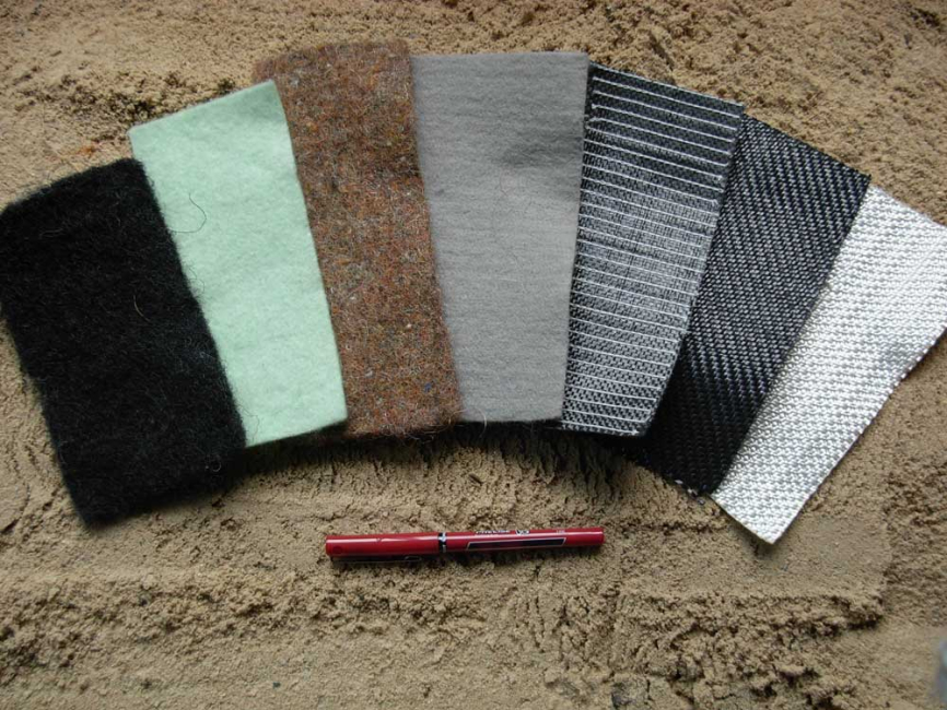 Seven samples of geotextile fabrics.