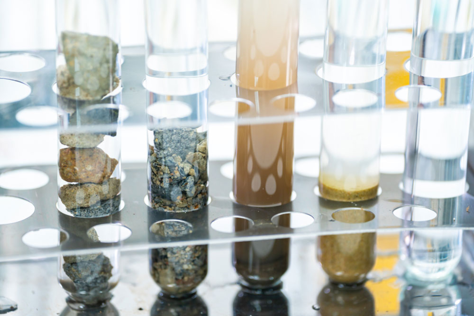 Various samples of water with suspended solids.